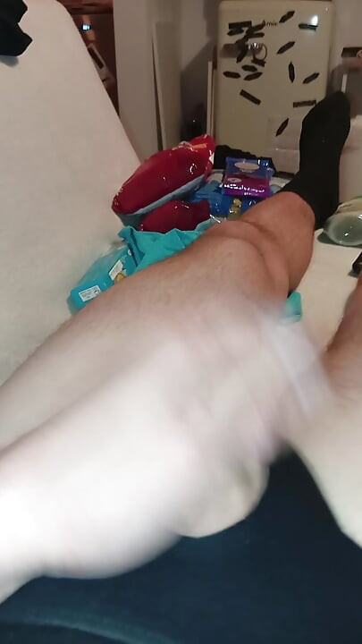 Man in black giving his Slip a white touch