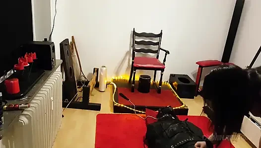 Curvy Brunette Dominatrix Commands Bound Slave in Fetish Dungeon