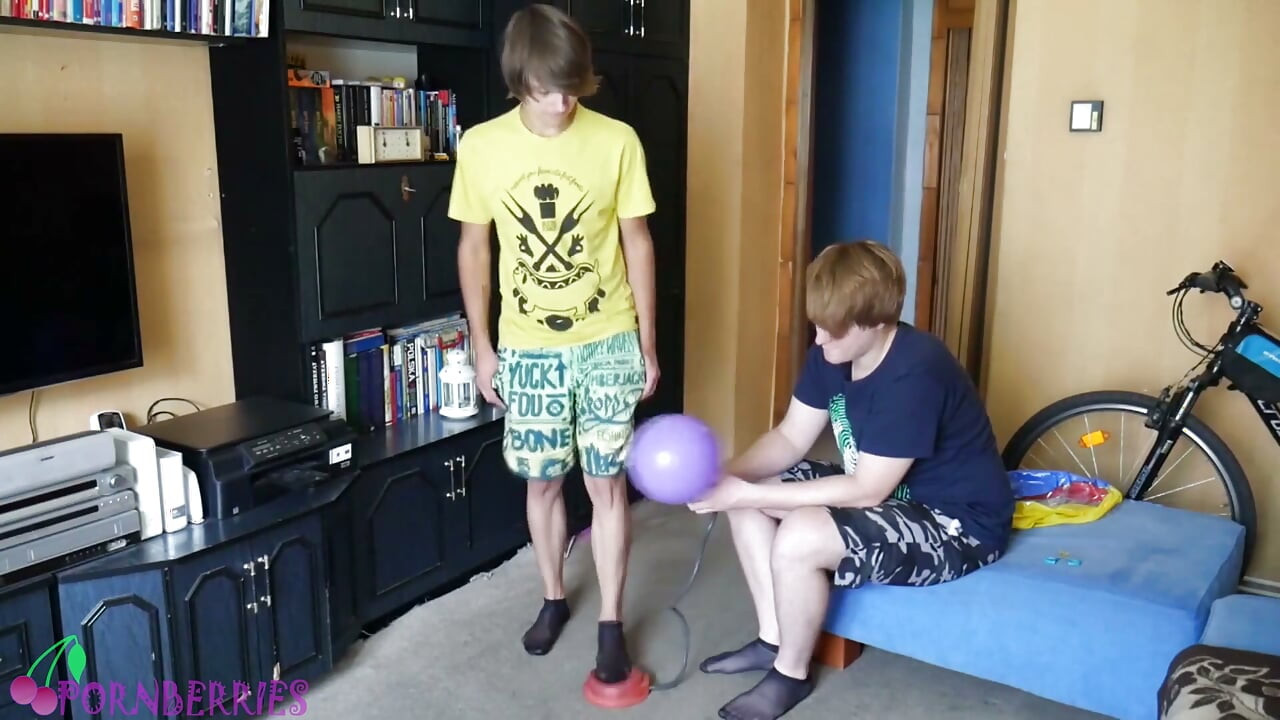 Thin, black socks blowing up balloons + footjob