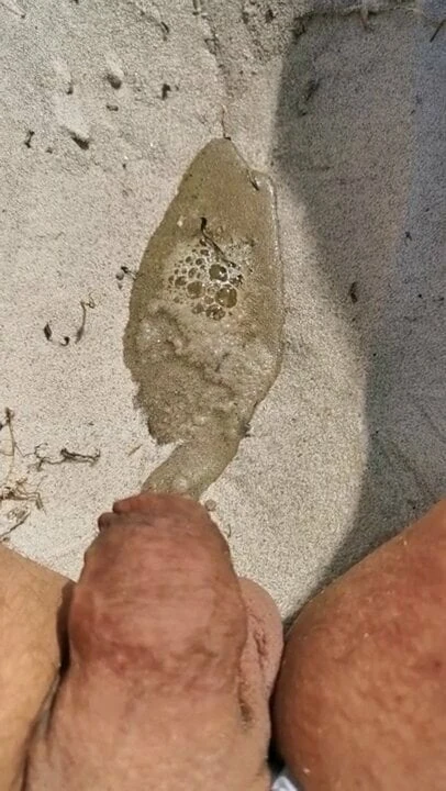 Peeing on the beach with panties on me