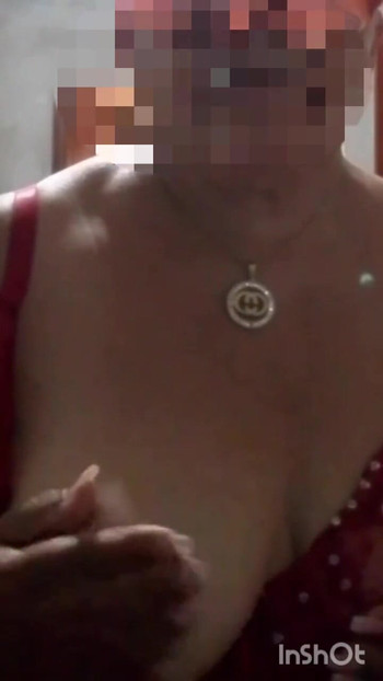 Key moment from "Widowed grandmother sends a video to her lover touching her tits"