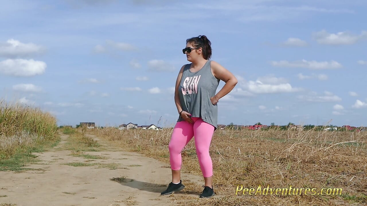 Fat brunette pees outside - Fat brunette's bladder was so full that she had to pee twice