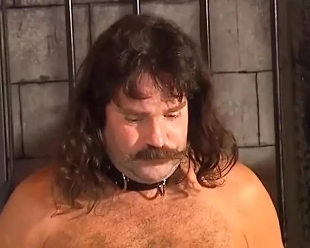 A brunette German MILF sucks two dicks after BDSM threesome