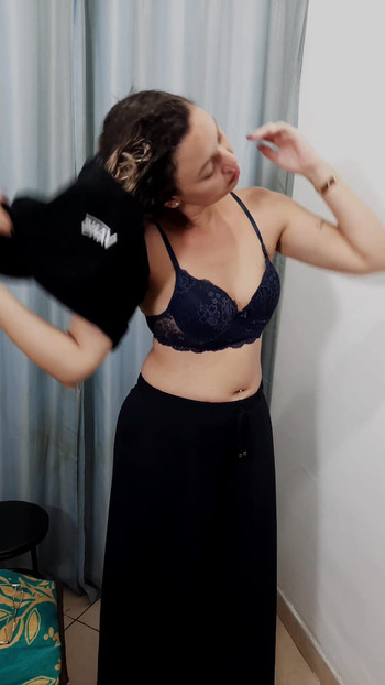 Powerful moment from "A store dressing room is used by a perverted couple."