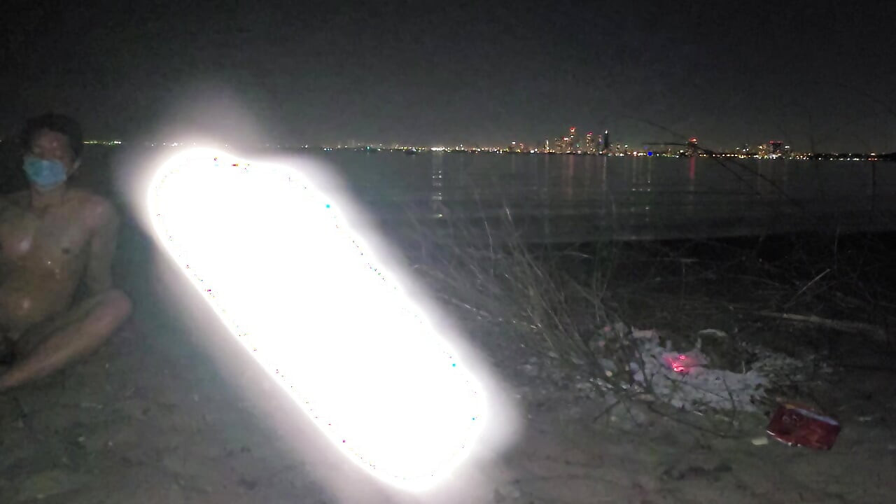 oiled masturbating and piss on the nude beach at night