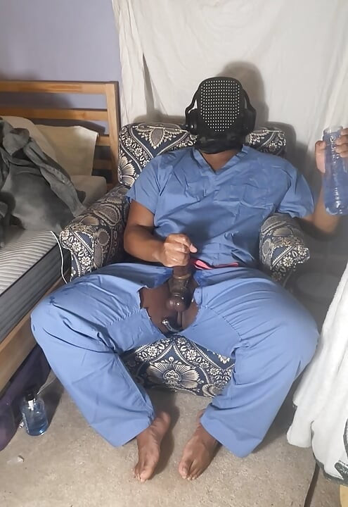 Man In Scrubs Jerking Out A Moaning Cumshot With Fleshlight