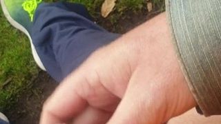 Jerking off and cumming in the open air in a park