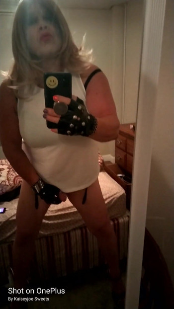 Stunning moment from "Krissy Sweets stroking her she cock in lingerie and high heels"