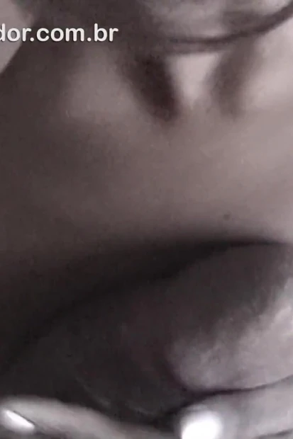 Brazilian black girl sucks big, big-headed cock in exhibitionist video