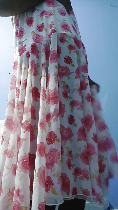 Shemale masterbate and cum wearing a silk seethrough fleard chiffon floral skirt