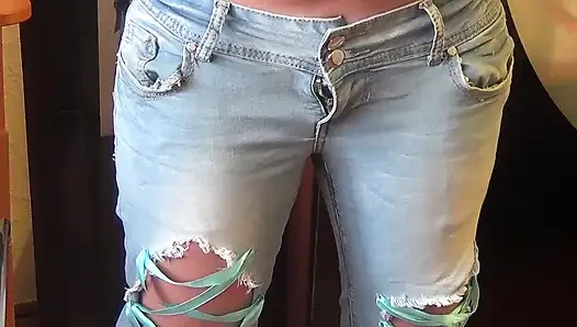 Kate peeing in jeans and masturbating by wet panties till she cum
