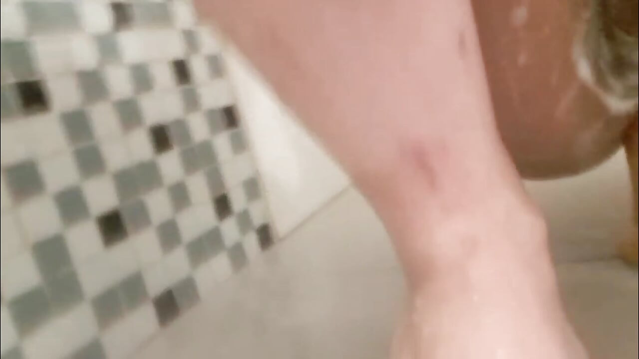 Brasilian Trans girl playing with toy in the shower