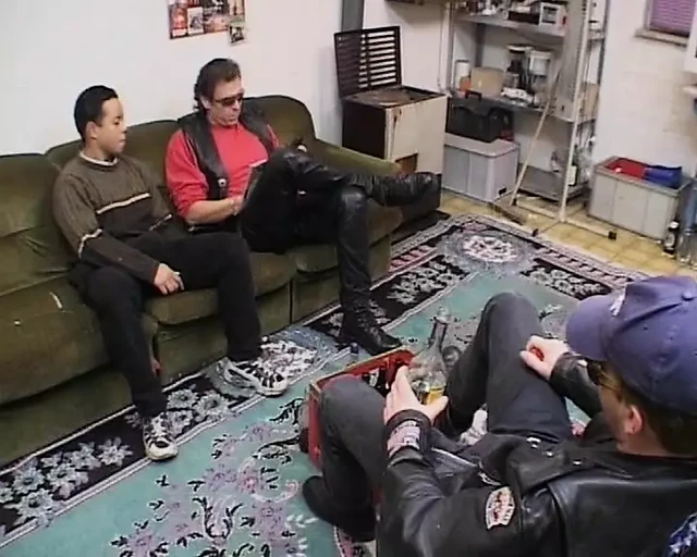 A cute German girl gets pleased by multiple horny dudes in the living room