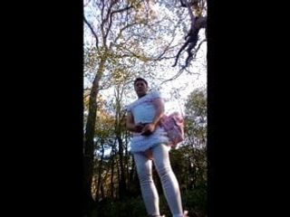 Sissy Hugh thompson walksing in the woods and being naughty