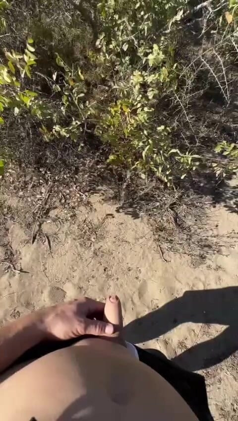 Liam pisses on the beach