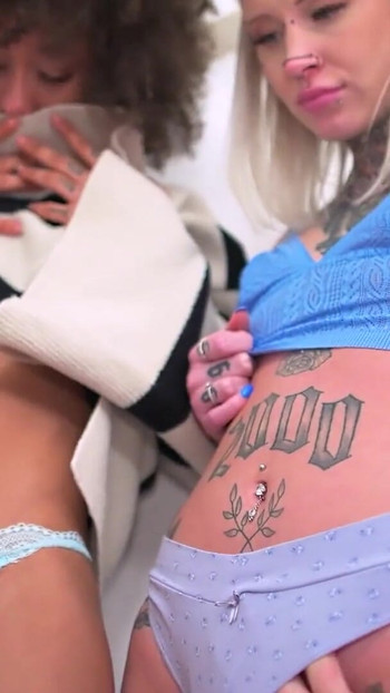 Stunning moment from "Inked Gurlz - A Ebony Black Babe and her Blonde BFF is Fucked in the Ass Anal"