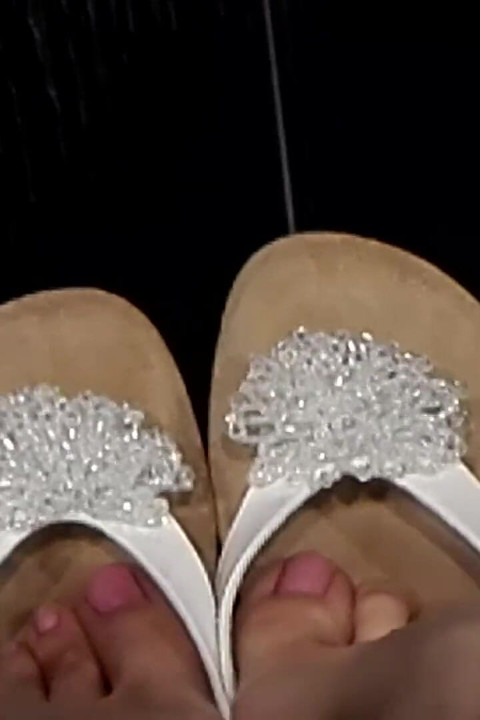 Shoeplay and Dangling in Cute White Flip Flops in a Store