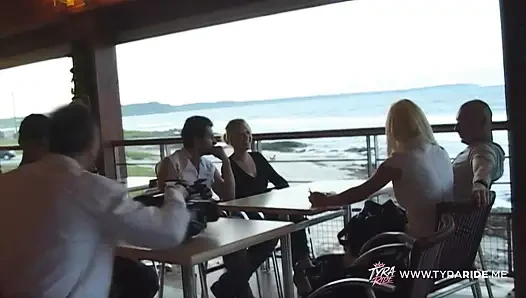 Blonde in Car During Nude Beach Film Shoot with Crew