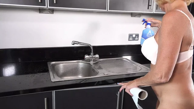 mature granny pissing in sink