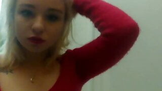 Lovely tender charming homemade striptease in a red sweater