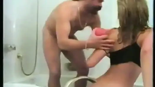 Alluring babe is getting pissed in the bathroom