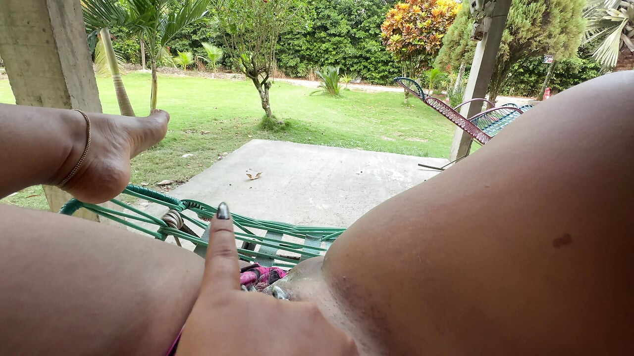 Colombian peasant woman masturbates outside her house for the neighbors to watch her