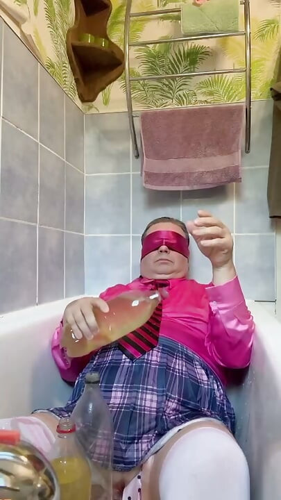 In a schoolgirl outfit to take a piss shower with bottles