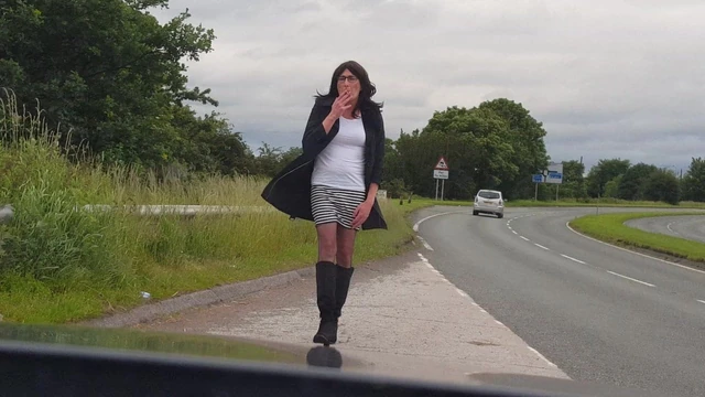 Slutty Sue in a lay by smoking