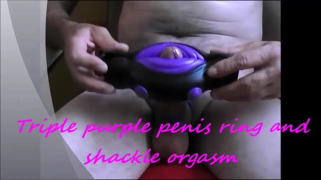 Triple purple penis ring and shackle orgasm
