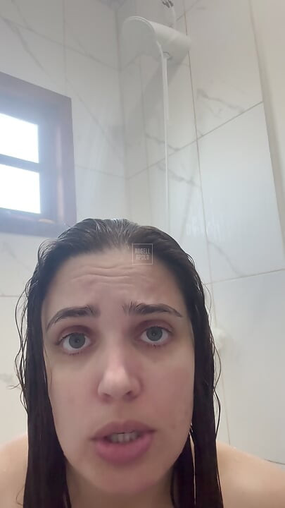 Naughty aunt makes naked call during shower