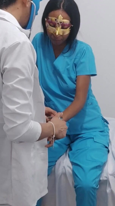 Medical colleagues do adult things on the hospital stretcher. | Clip 1