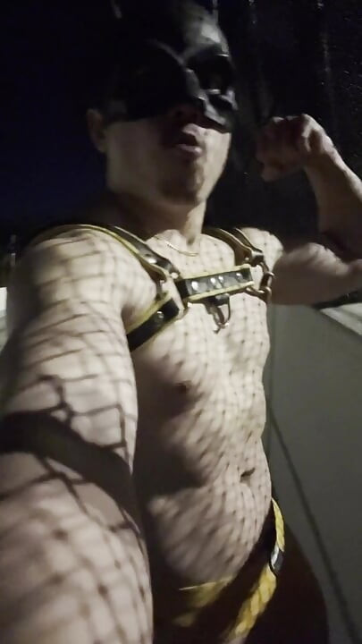Midnight Muscle Tease: Asian Hunk Flexes Ass & Biceps in Yellow Harness on Highway Bridge