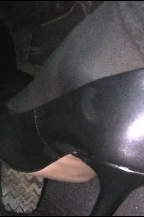 Revving and Driving in Black Pantyhose and Grey High Heels