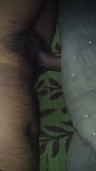 Feed under a quilt on the bed.