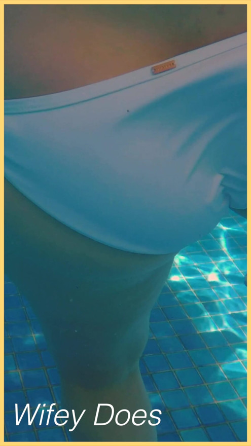 Wifey swims in the pool with perfect body