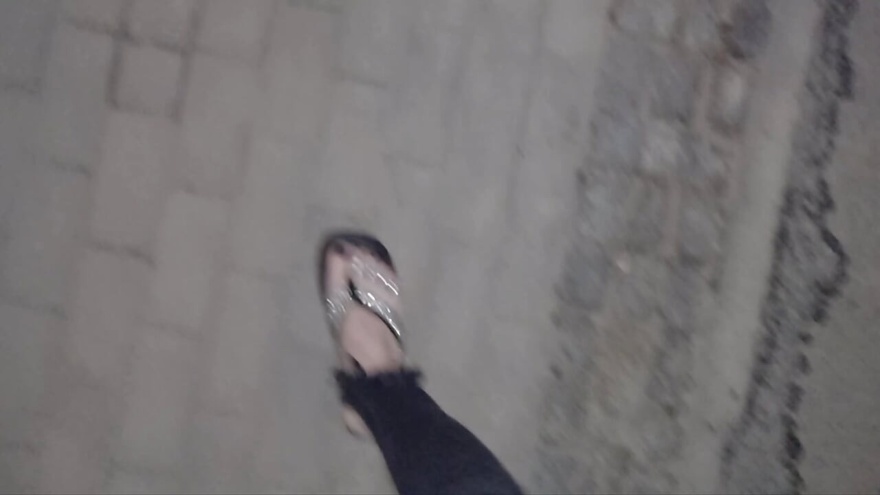 I wear platform flip-flops and tight jeans, showing off my feet.