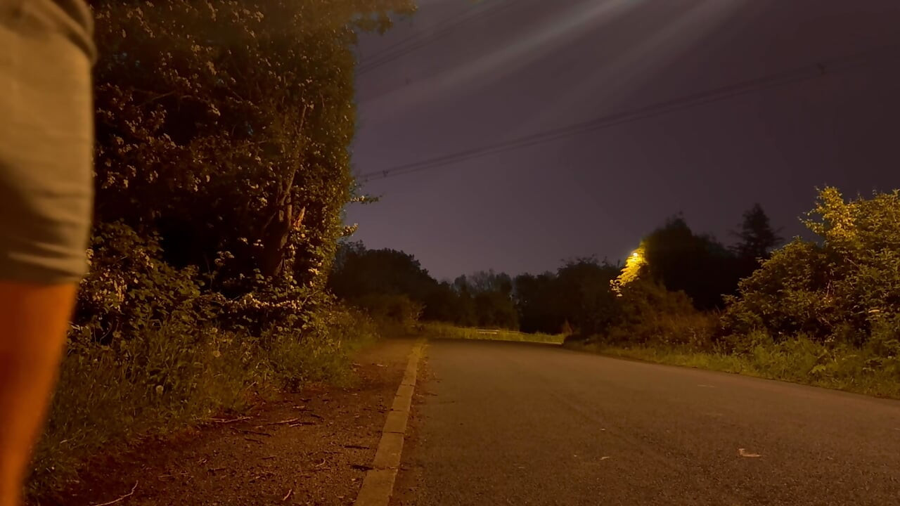 Barefoot nude in road