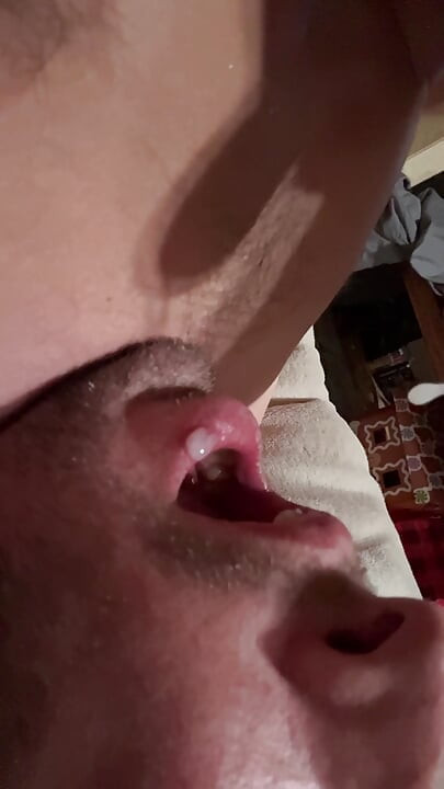 Swallowing mouthful of cum