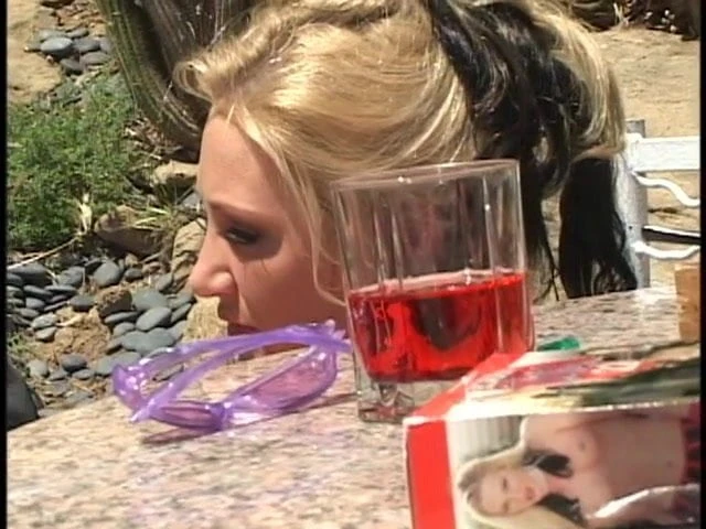 Lesbian chicks using a strap-on outdoors