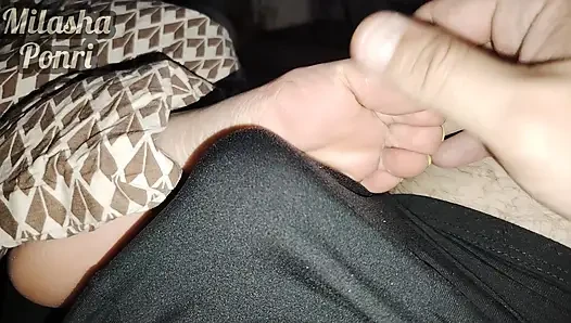 Stepsister's feet get a light massage while watching a movie