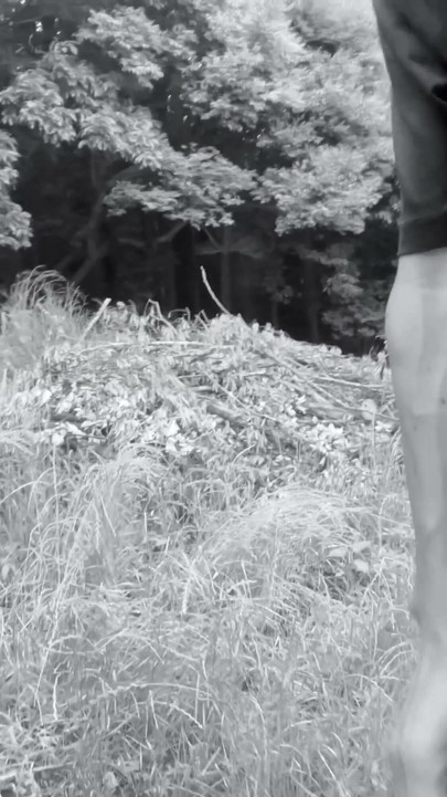 A young boy with a small foreskin exposes himself in the woods | Clip 1