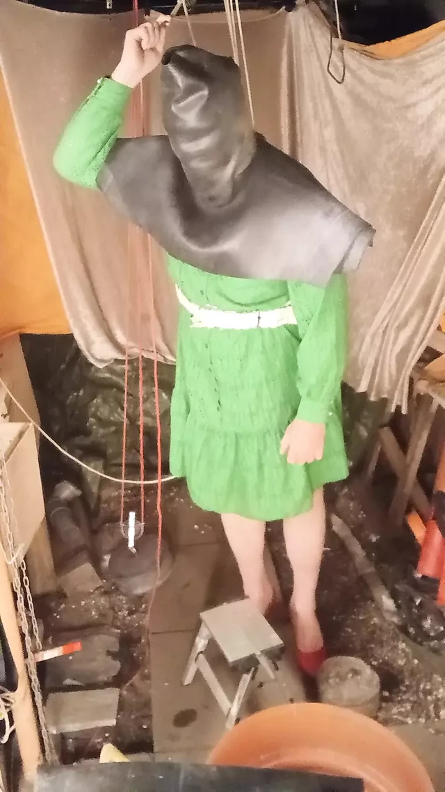 Green housewife with rubber head