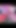 Pembe çoraplı iç çamaşırlı transeksüel duvarda siyah dildoya biniyor