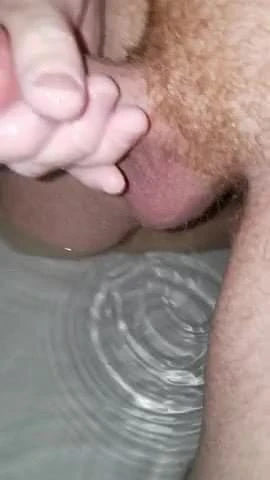 Cumming underwater in bathtub