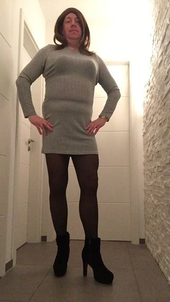 Nicki-Crossdress in a beautiful grey Mini-Dress, black Pantyhose and Plateau-Boots