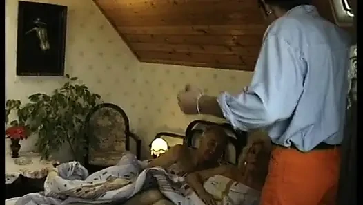 Hairy blonde mature gets spitroasted in a threesome