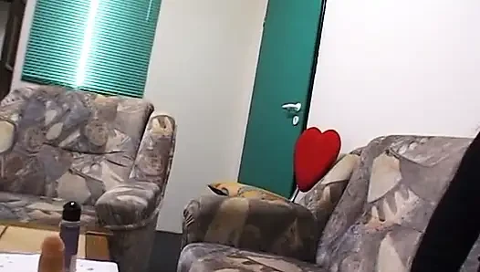 Sexy brunette teen is filling her twat with a big dildo
