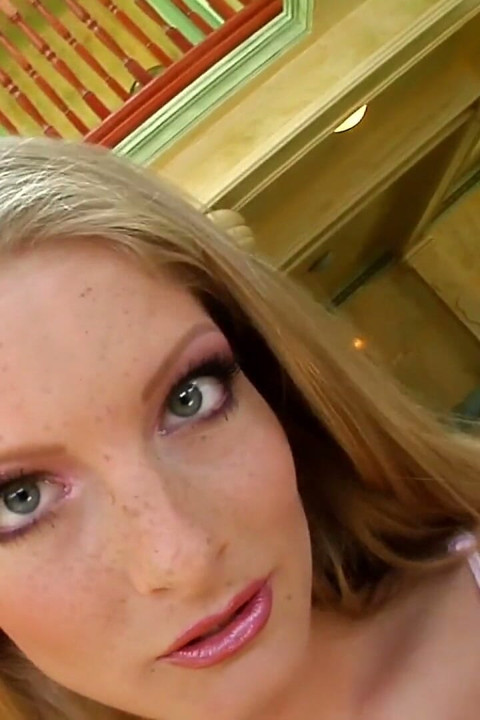 Oiled Blonde Stretches Her Pussy with a Thick Glass Dildo
