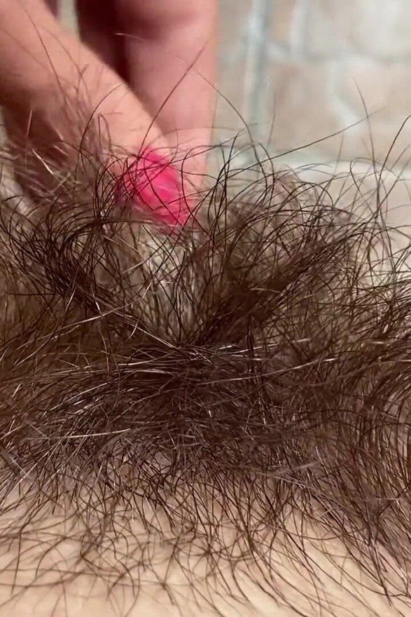 De cerca, gran clítoris peludo coño