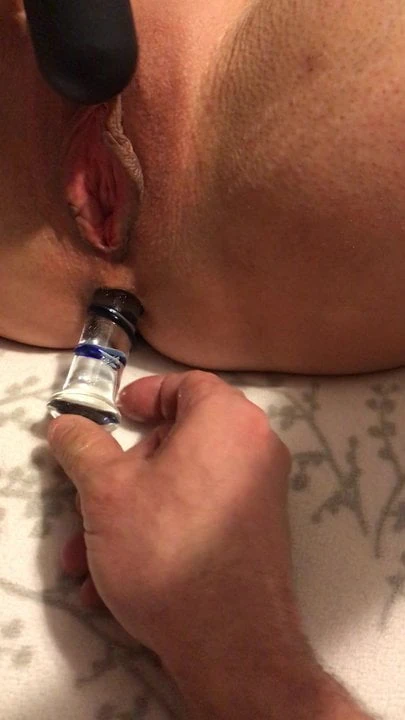 Glass dildo in ass